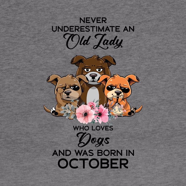 Never Underestimate An Old Woman Who Loves Dogs And Was Born In October by Happy Solstice